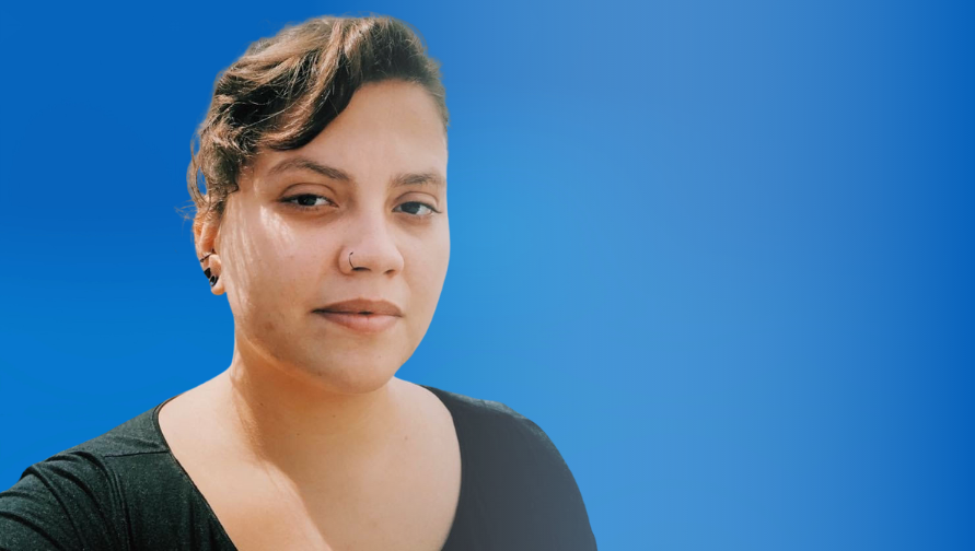 A headshot of Natalia Affonso against a blue background