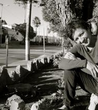 Black and white photo of Yolanda Venegas sitting down