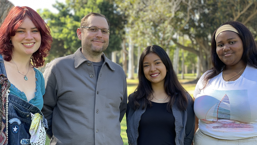 Scott Lerner and a group of first-gen students smiling