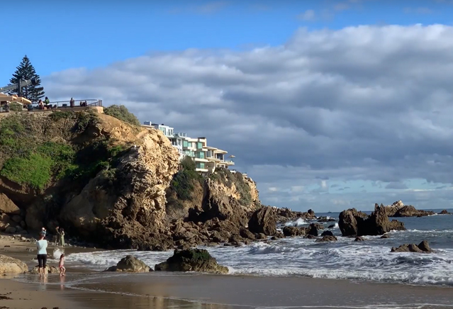 A picture of the beach and cliffs. 