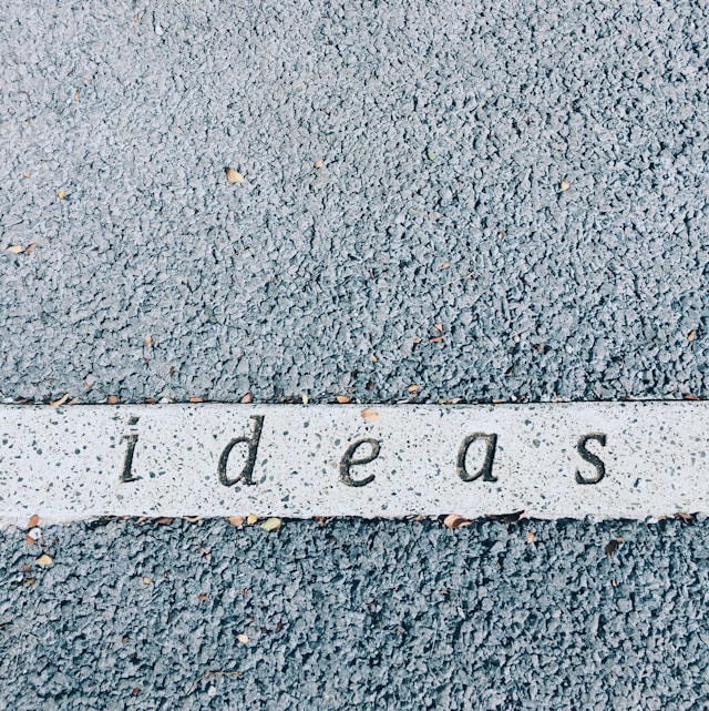 gray concrete with ideas carved on light colored strip