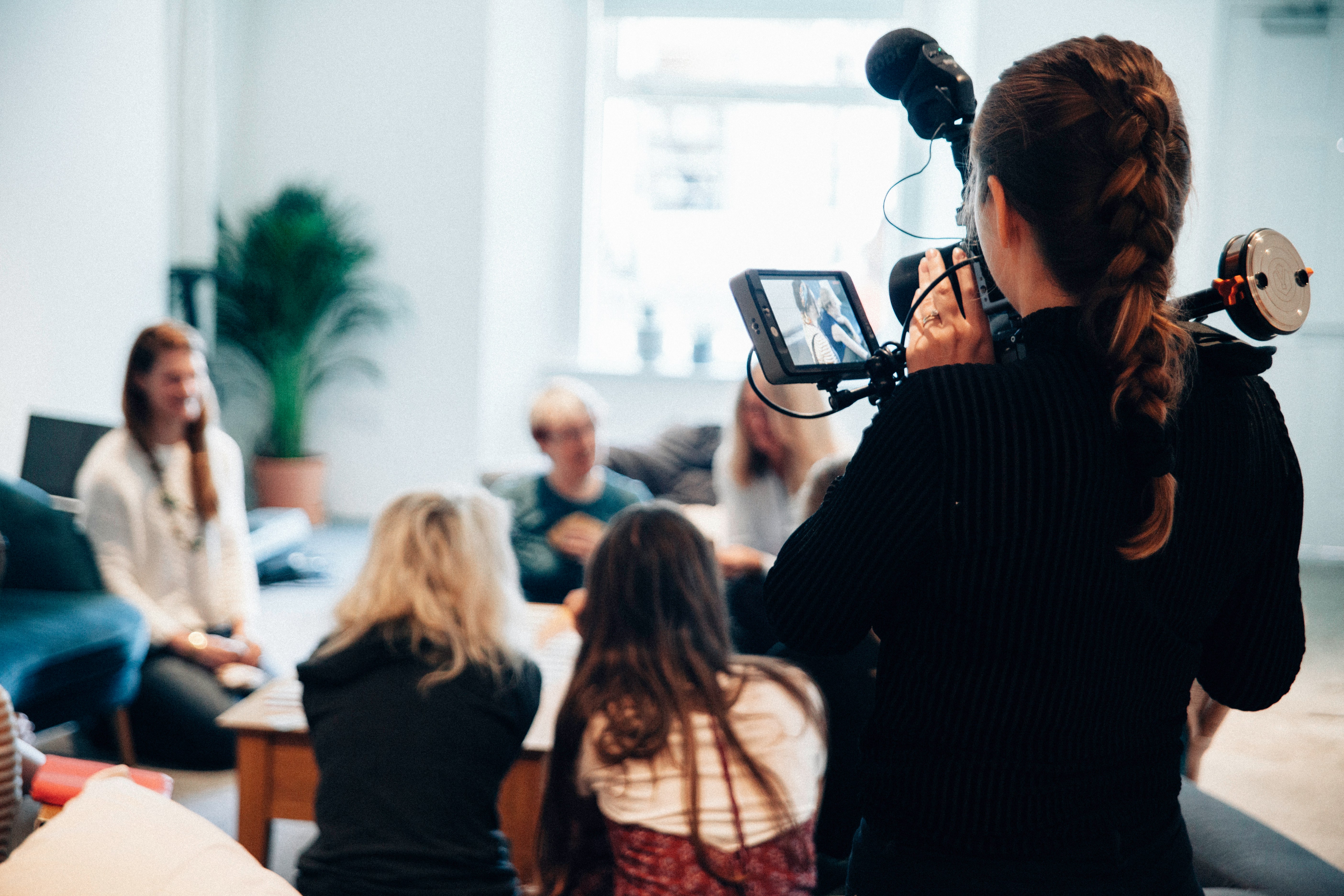 A woman using a camera