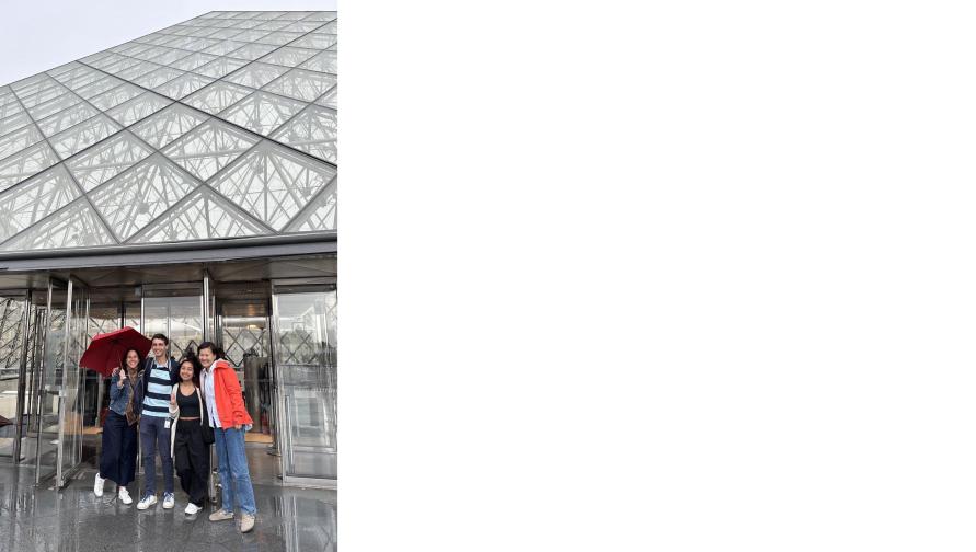 Students at the Louvre pyramid