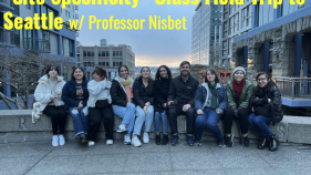 “Site Specificity” Class Field Trip to Seattle with Professor Nisbet, class posing for picture outside of Seattle