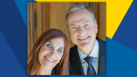 A close-up of Susan Samueli and Henry Samueli, who smile for the camera