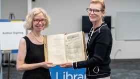 Julia Lupton and Andrea Mays with UCI's copy of the First Folio