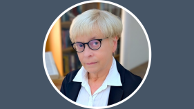 short haired woman not smiling