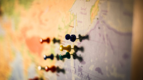 Globe with push pins