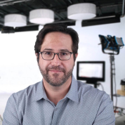 Fabian Marquez smiling in front of a photo shoot set