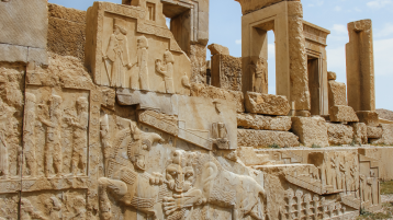 A photo of the interesting scene of the lion devouring the bull on the Apadana palace at Persepolis may symbolize the end of winter and the beginning of spring. 