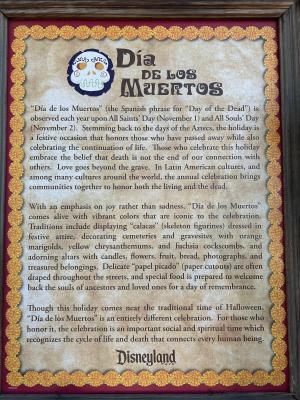 Dia De Los Muertos sign near ofrendas at Disneyland Park