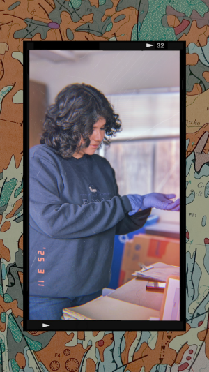 Student wearing gloves against a colorful background