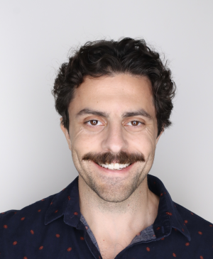 John Comerci smiling