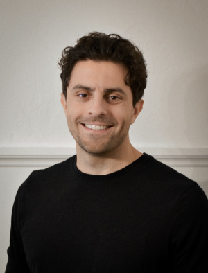 John Comerci smiling