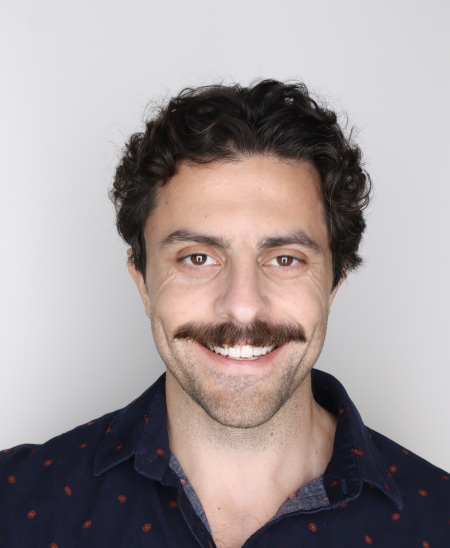 John Comerci smiling