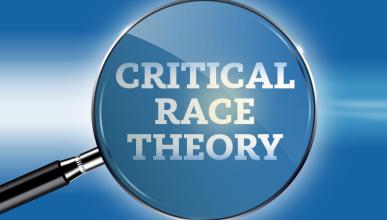 Critical race theory text under a magnifying glass