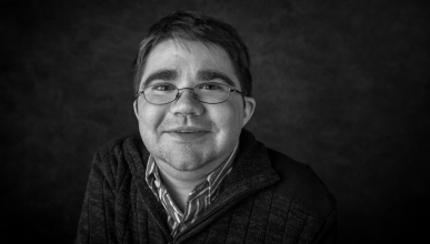 A black and white headshot of Buddy Cassidy