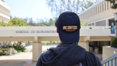 Student in front of Humanities Gateway