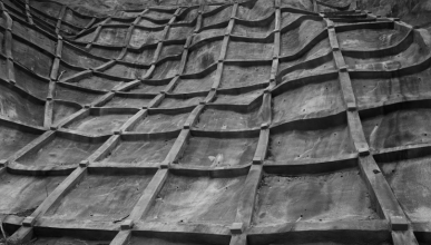 concrete grid covering hill