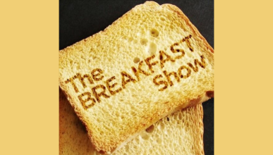 Piece of toast with The Breakfast Show branded onto it.