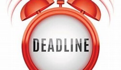 Red Clock with the word deadline in it