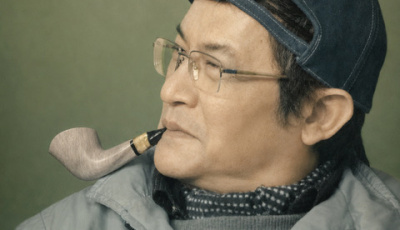 Ackbar Abbas with pipe