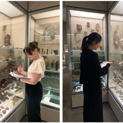 Melissa DePierro and Maddy Hua taking notes in the Met.